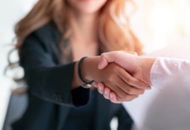Two people shaking hands